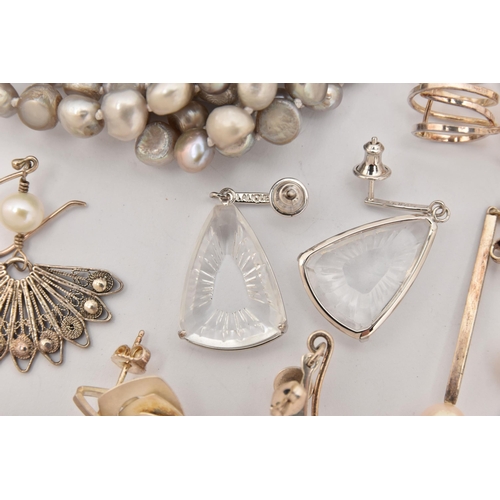 502 - AN ASSORTMENT OF WHITE METAL EARRINGS AND A BRACELET, to include a pair of white metal drop earrings... 