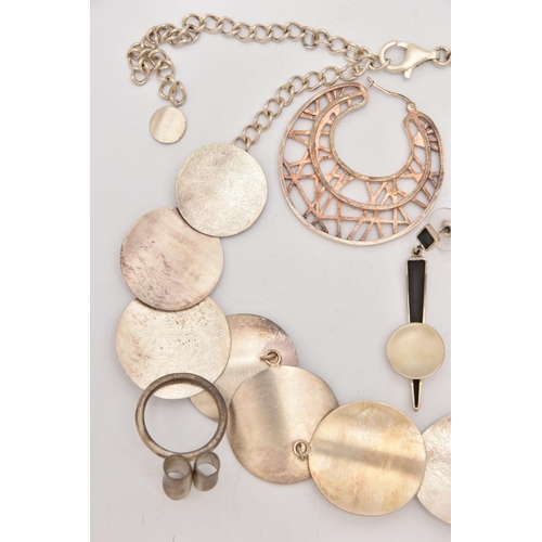 503 - AN ASSORTMENT OF WHITE METAL JEWELLERY, to include a white metal abstract design necklace and earrin... 