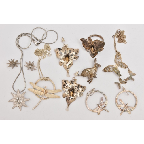 505 - AN ASSORTMENT OF WHITE METAL JEWELLERY, to include a floral earring and ring set, a dragonfly earrin... 