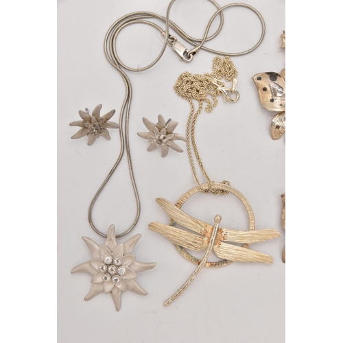 505 - AN ASSORTMENT OF WHITE METAL JEWELLERY, to include a floral earring and ring set, a dragonfly earrin... 