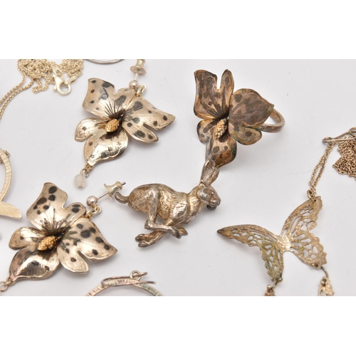 505 - AN ASSORTMENT OF WHITE METAL JEWELLERY, to include a floral earring and ring set, a dragonfly earrin... 