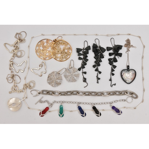 507 - AN ASSORTMENT OF WHITE METAL JEWELLERY, to include a charm bracelet, two necklaces, three pairs of e... 