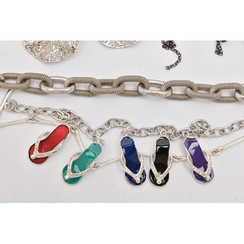 507 - AN ASSORTMENT OF WHITE METAL JEWELLERY, to include a charm bracelet, two necklaces, three pairs of e... 