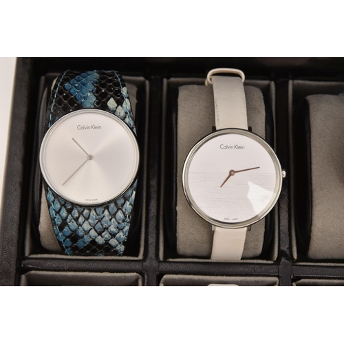 524 - A CASE OF 'CALVIN KLEIN' WRISTWATCHES, twelve ladies quartz movement wristwatches, all encased in in... 