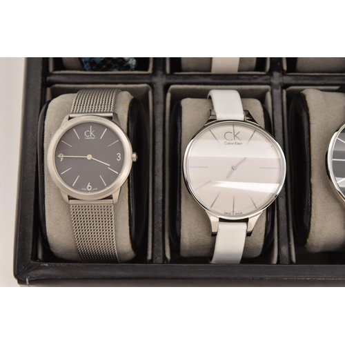 524 - A CASE OF 'CALVIN KLEIN' WRISTWATCHES, twelve ladies quartz movement wristwatches, all encased in in... 