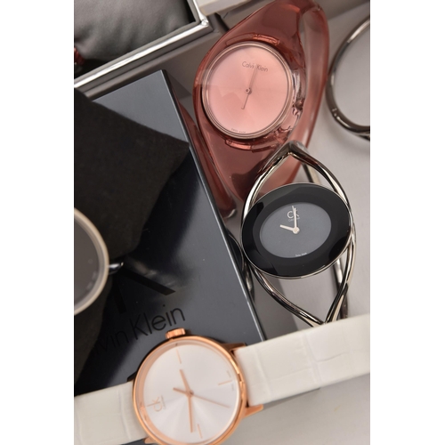 525 - AN ASSORTMENT OF 'CALVIN KLEIN' WATCHES, twelve ladies quartz movement wristwatches, five with boxes... 