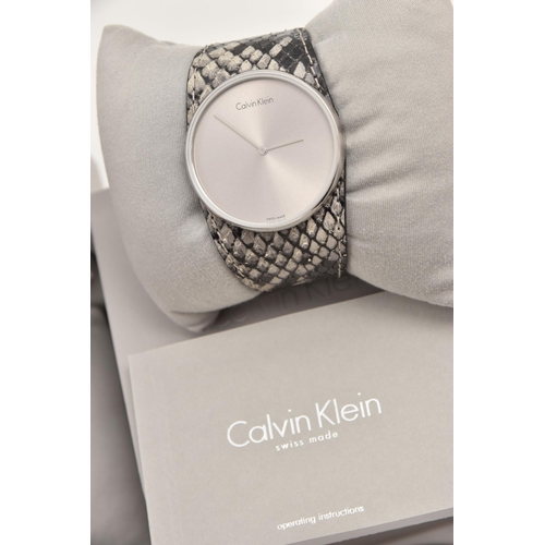 525 - AN ASSORTMENT OF 'CALVIN KLEIN' WATCHES, twelve ladies quartz movement wristwatches, five with boxes... 