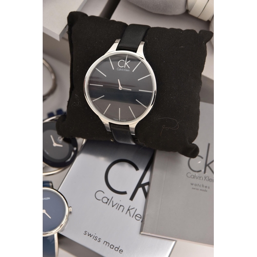 525 - AN ASSORTMENT OF 'CALVIN KLEIN' WATCHES, twelve ladies quartz movement wristwatches, five with boxes... 