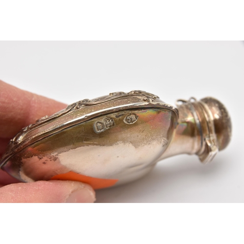 548 - AN EARLY 20TH CENTURY SILVER SCENT BOTTLE, in the form of a heart embossed with a cherub and floral ... 