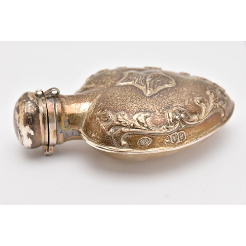 548 - AN EARLY 20TH CENTURY SILVER SCENT BOTTLE, in the form of a heart embossed with a cherub and floral ... 