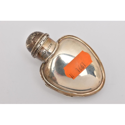 549 - AN EARLY 20TH CENTURY SILVER HEART SHAPE SCENT BOTTLE, in the form of a polished heart, hinged openi... 