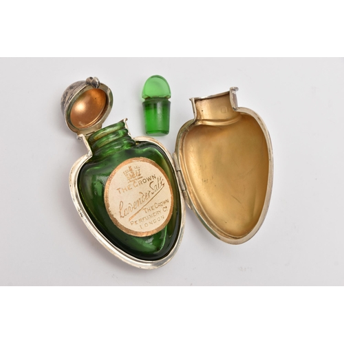 549 - AN EARLY 20TH CENTURY SILVER HEART SHAPE SCENT BOTTLE, in the form of a polished heart, hinged openi... 