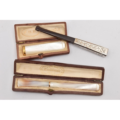 553 - THREE LADIES CHEROOTS, to include a carved and polished mother of pearl cheroot fitted with a thin y... 