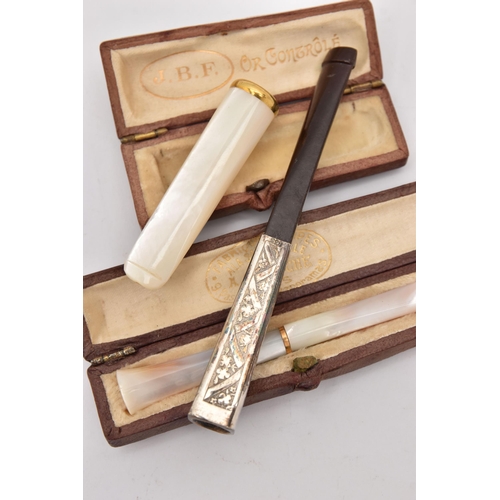 553 - THREE LADIES CHEROOTS, to include a carved and polished mother of pearl cheroot fitted with a thin y... 