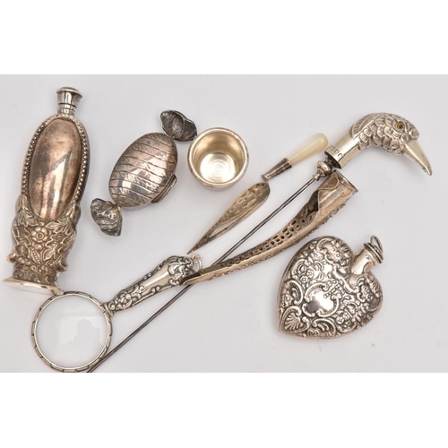 556 - A SMALL ASSORTMENT OF SILVER ITEMS, to include a silver scent bottle on a round base, screw cover, h... 