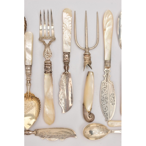 557 - AN ASSORTMENT OF 19TH AND 20TH CENTURY SILVER AND MOTHER OF PEARL CUTLERY PIECES, to include three b... 