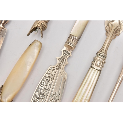 557 - AN ASSORTMENT OF 19TH AND 20TH CENTURY SILVER AND MOTHER OF PEARL CUTLERY PIECES, to include three b... 