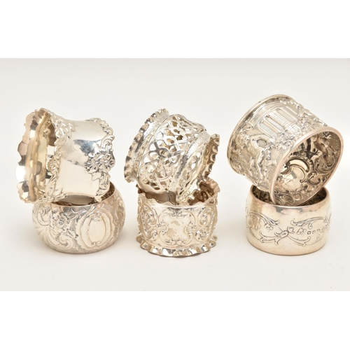 558 - SIX SILVER NAPKIN RINGS, various designs all with a full silver hallmarks, assay offices to include ... 