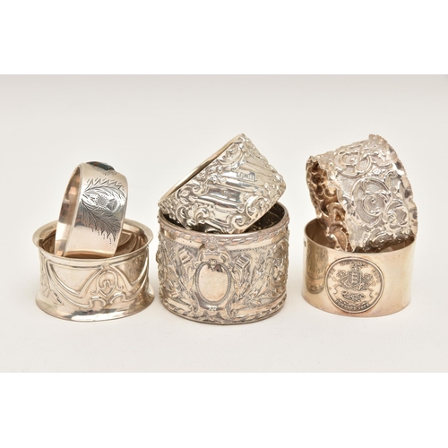 559 - SIX SILVER NAPKIN RINGS, various designs all with full silver hallmarks, assay offices to include Ch... 