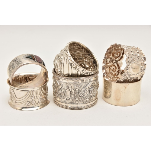 559 - SIX SILVER NAPKIN RINGS, various designs all with full silver hallmarks, assay offices to include Ch... 