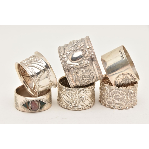 559 - SIX SILVER NAPKIN RINGS, various designs all with full silver hallmarks, assay offices to include Ch... 