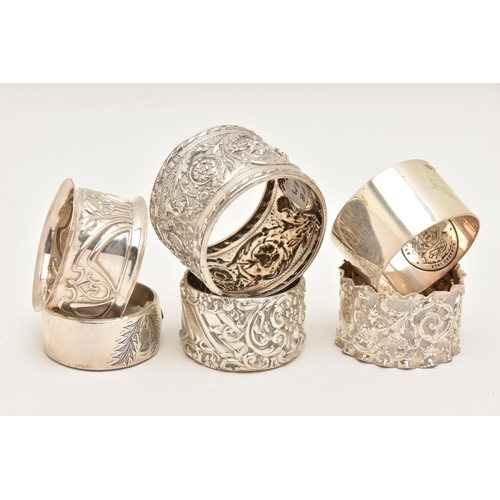 559 - SIX SILVER NAPKIN RINGS, various designs all with full silver hallmarks, assay offices to include Ch... 