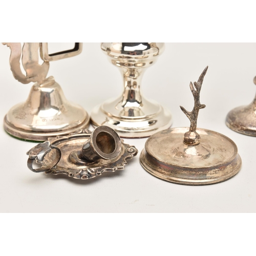 563 - AN ASSORTMENT OF SILVER ITEMS, to include a silver posy vase with wavy rim, on a round weighted base... 