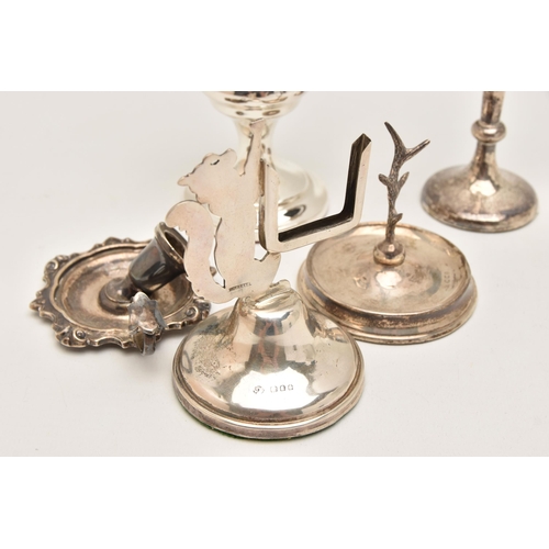 563 - AN ASSORTMENT OF SILVER ITEMS, to include a silver posy vase with wavy rim, on a round weighted base... 