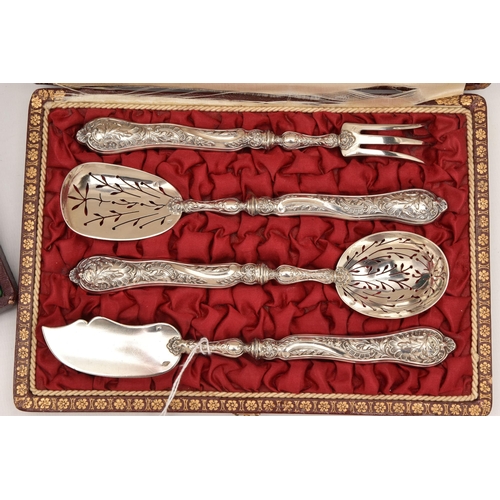 564 - A CASED SET OF TWO FRENCH SPOONS AND ANOTHER SET OF CUTLERY, the first a serving spoon with shell sh... 