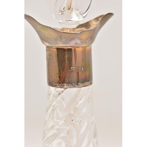 574 - A LATE VICTORIAN 'JAMES DEAKIN & SONS' GLASS DECANTER, rounded base with twisted stem, silver collar... 