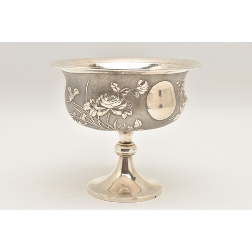 581 - AN EARLY 20TH CENTURY CHINESE SILVER PEDESTAL BOWL, embossed with a floral pattern on a textured bac... 