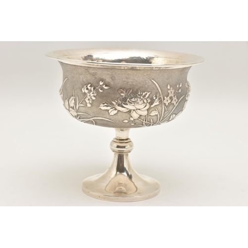 581 - AN EARLY 20TH CENTURY CHINESE SILVER PEDESTAL BOWL, embossed with a floral pattern on a textured bac... 