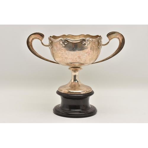 583 - AN EARLY 20TH CENTURY CHINESE SILVER PRESENTATION TWIN HANDLED TROPHY CUP WITH HARDWOOD PLINTH, poli... 