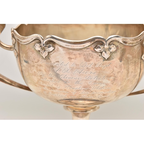 583 - AN EARLY 20TH CENTURY CHINESE SILVER PRESENTATION TWIN HANDLED TROPHY CUP WITH HARDWOOD PLINTH, poli... 