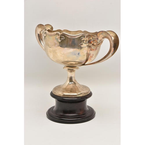 583 - AN EARLY 20TH CENTURY CHINESE SILVER PRESENTATION TWIN HANDLED TROPHY CUP WITH HARDWOOD PLINTH, poli... 