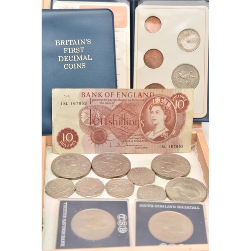 606 - A WOODEN BOX CONTAINING COINS, COMMEMORATIVES AND DECIMAL PACKS ETC