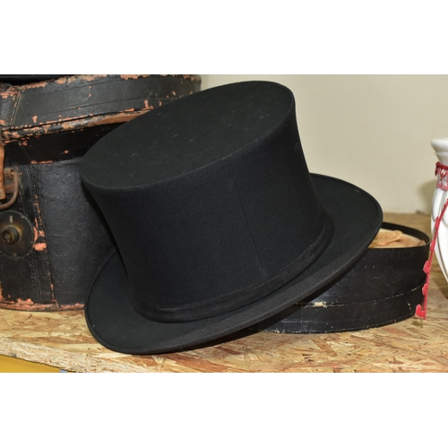 765 - TWO VINTAGE TOP HATS WITH LEATHER CASE, comprising a Lincoln Bennett & Co black silk top hat 59cm wi... 