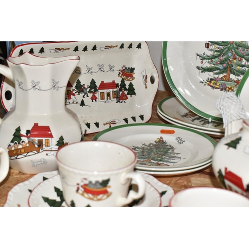 768 - A GROUP OF CHRISTMAS TABLEWARE, comprising Mason's Ironstone 'Christmas Village', 1983, designed by ... 