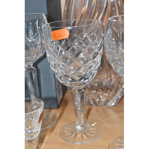 801 - A GROUP OF WATERFORD CRYSTAL, comprising seven Lismore pattern hock glasses, of which two are boxed,... 