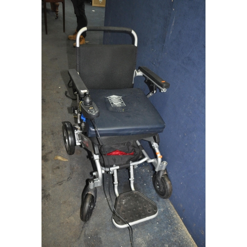 2 - A FREEDOM CHAIR ELECTRIC WHEELCHAIR, with power supply (PAT pass and working) Condition Report: no o... 