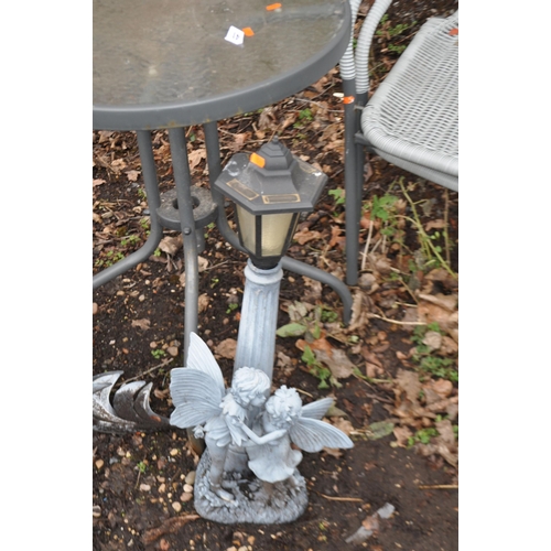 33 - A MODERN GLASS TOPPED METAL GARDEN TABLE, two chairs, a plastic fairy lantern and a wooden garden or... 