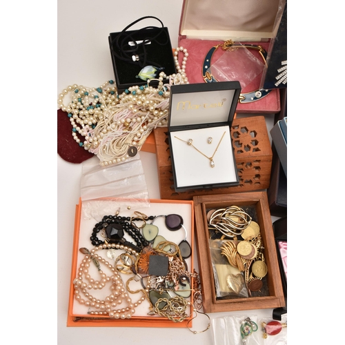 591 - A BOX OF ASSORTED ITEMS, to include various imitation pearl necklaces, brooches, pendants, a flaming... 