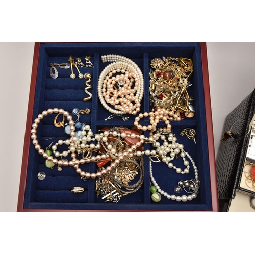 592 - TWO JEWELLERY BOXES OF ASSORTED COSTUME JEWELLERY, a hinged lid patent jewellery box and a hinged li... 