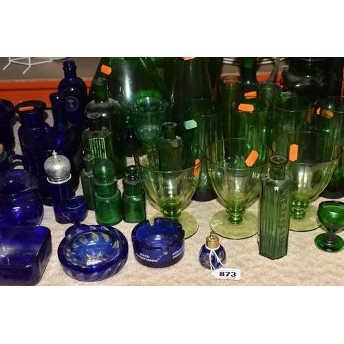 873 - A COLLECTION OF COLOURED GLASSWARE, to include over forty pieces of mainly green and blue glass, a p... 