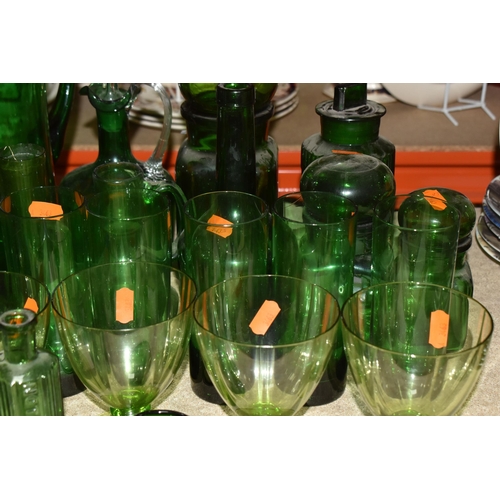 873 - A COLLECTION OF COLOURED GLASSWARE, to include over forty pieces of mainly green and blue glass, a p... 