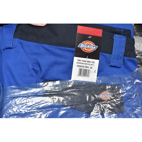 911 - TWO BOXES OF DICKIES WORKWEAR TROUSERS, over twenty pairs of Dickies workwear trousers in various co... 