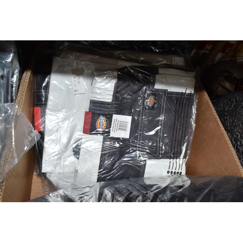 911 - TWO BOXES OF DICKIES WORKWEAR TROUSERS, over twenty pairs of Dickies workwear trousers in various co... 