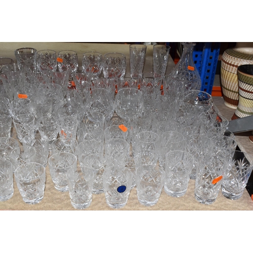 925 - A GROUP OF CUT CRYSTAL AND GLASSWARE,  to include a miniature Edinburgh Crystal clock, an engraved d... 