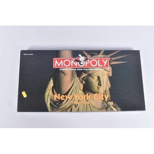 18 - FOUR BOXED US CITY USAOPOLY MONOPOLY SETS, to include a sealed 2001 New York City, a unsealed 1998 N... 