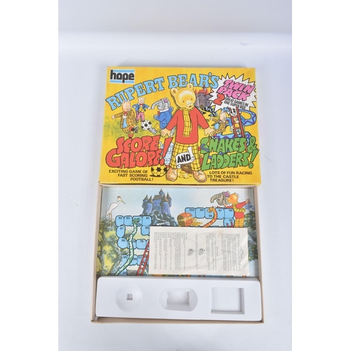 26 - A COLLECTION OF RUPERT THE BEAR RELATED ITEMS, to include assorted jigsaws by Hope/Hestair, contents... 